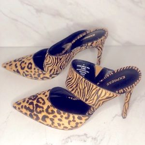 Very cute mule style heels Leopard/tiger print about a 3 1/2-4 inch he